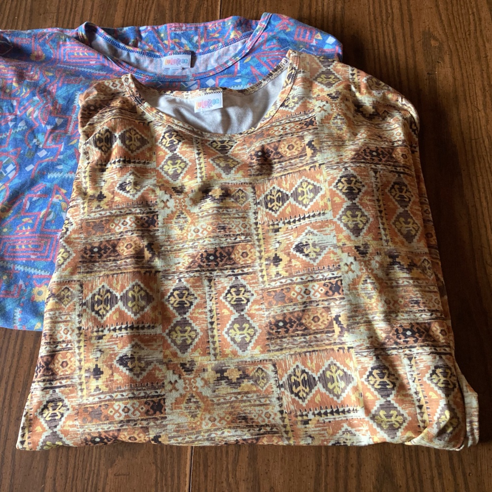 Two women’s Sz 3X Lularoe T-shirts, long in the back  short sleeved round neck